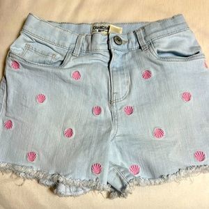 Girls shorts with pink sea shells on front